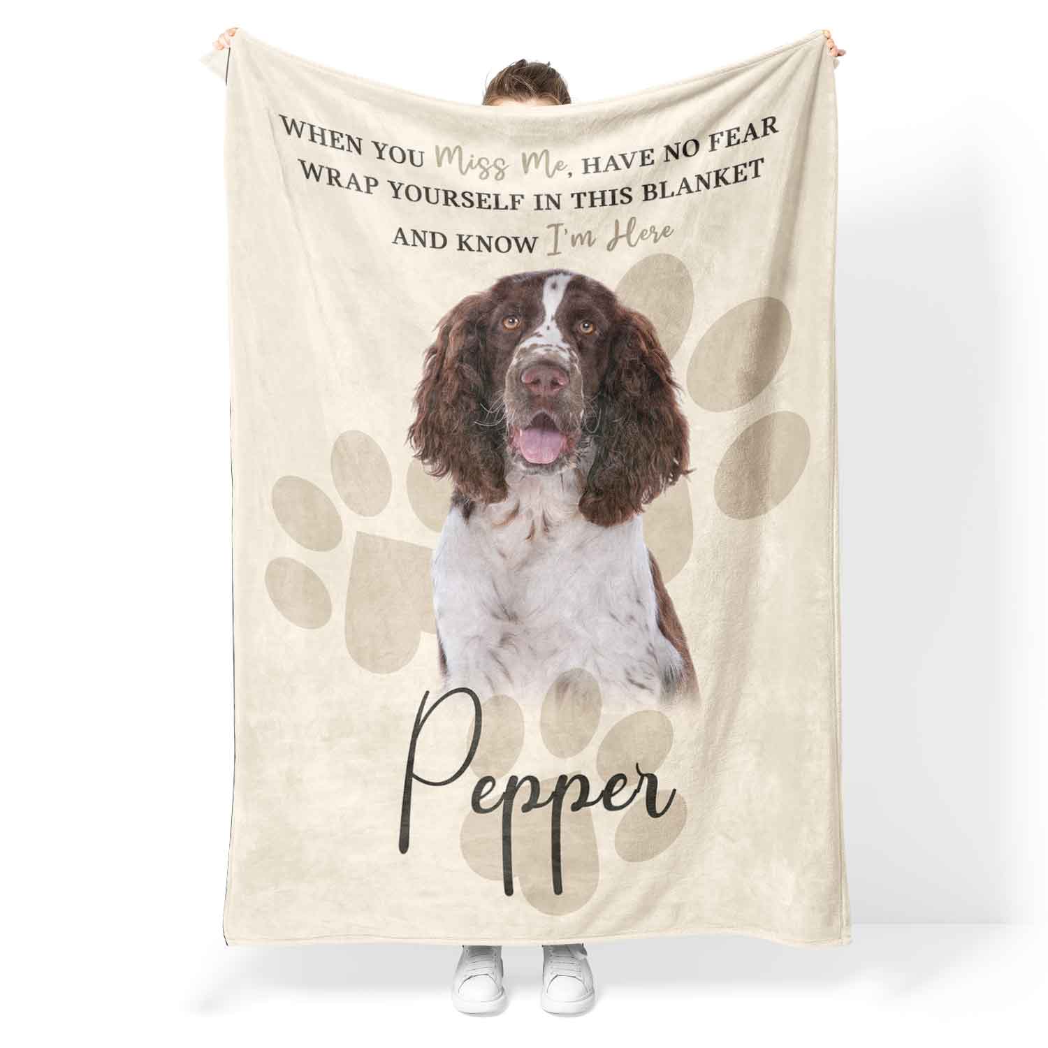 Blanket with a dog's face and text on a white background