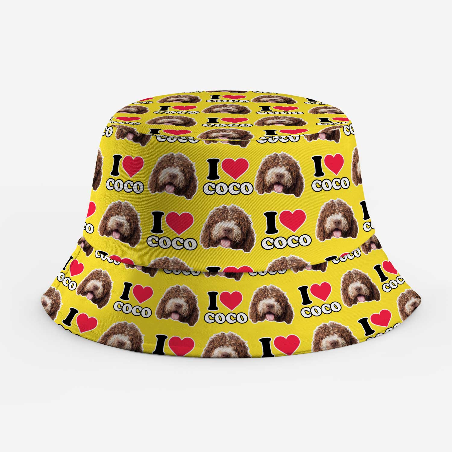 Yellow bucket hat with 'I love Coco' text and dog pattern on a white background